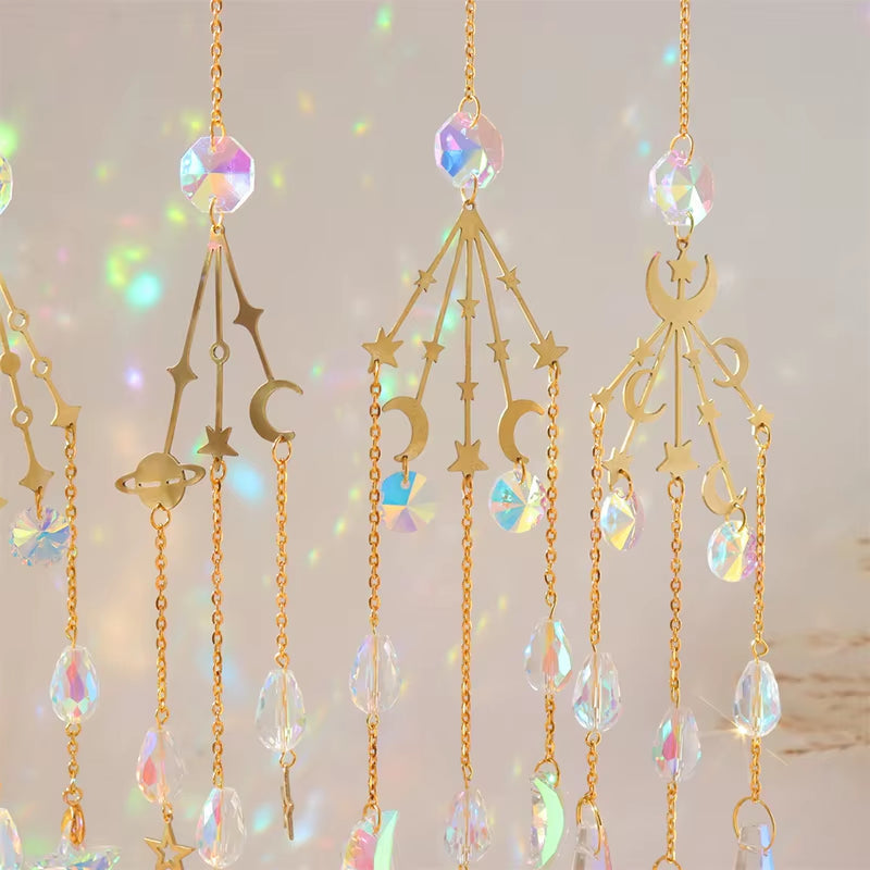 Delicate golden celestial suncatchers with crystal prisms and moons for decoration