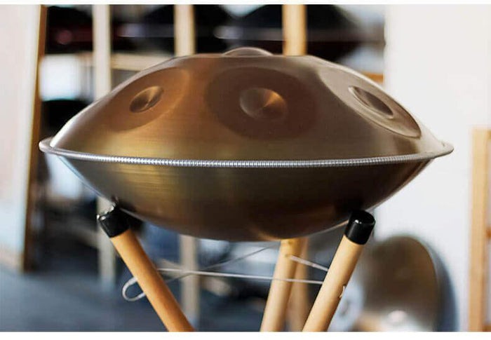 UFO-shaped D Minor Kurd Handpan Drum for Beginners & Pros with mallets underneath