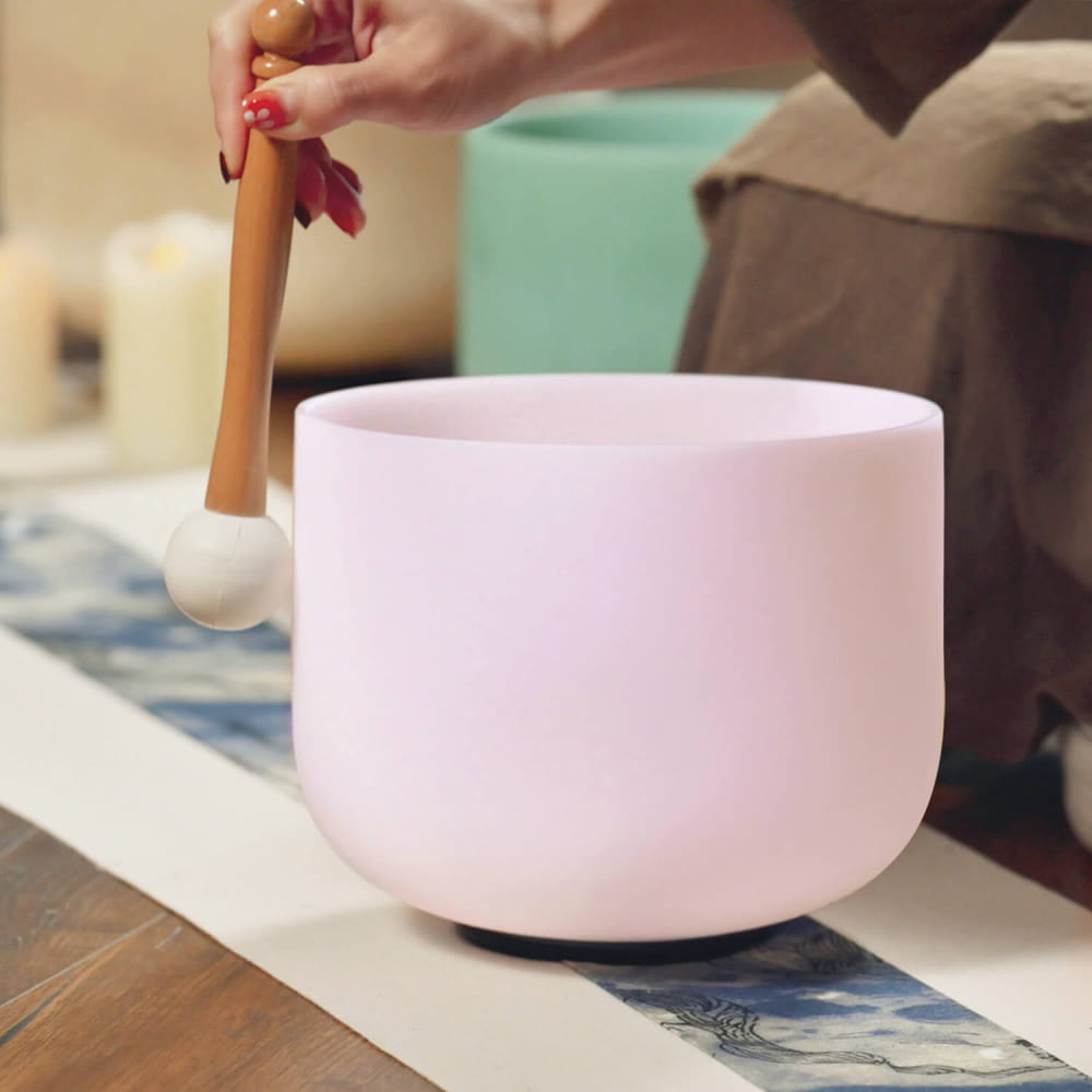 Pink Rose Quartz Gemstone Fusion Crystal Singing Bowl with wooden mallet displayed