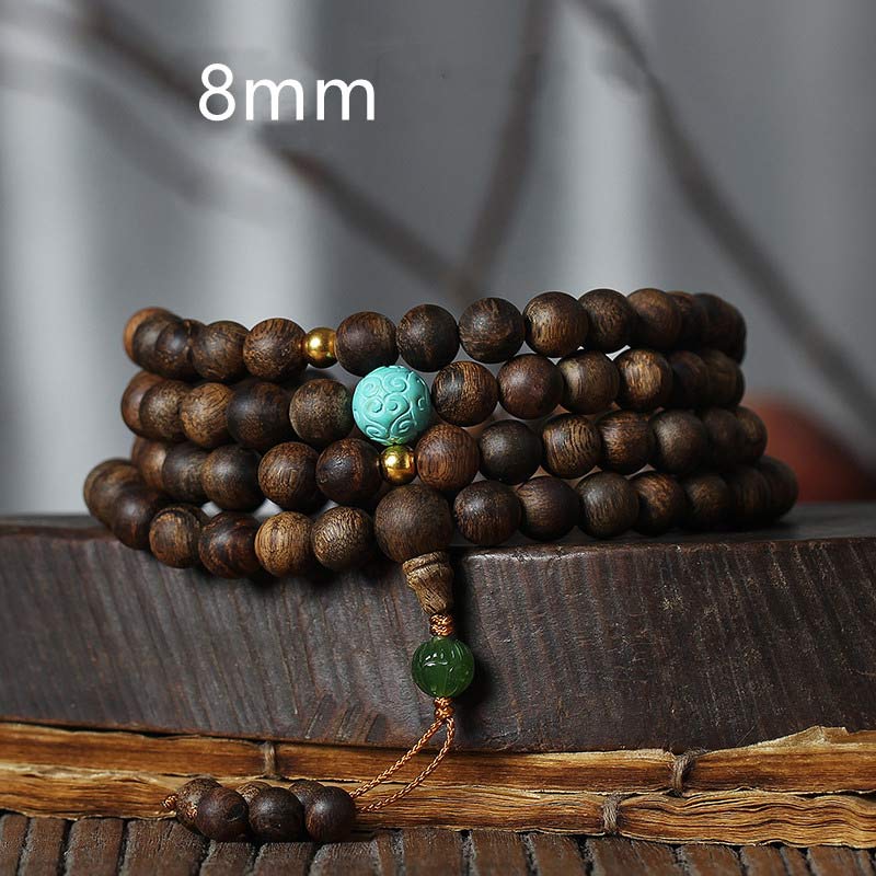 Bracelet Mala 108 perles en bois d'agar turquoise pour la méditation