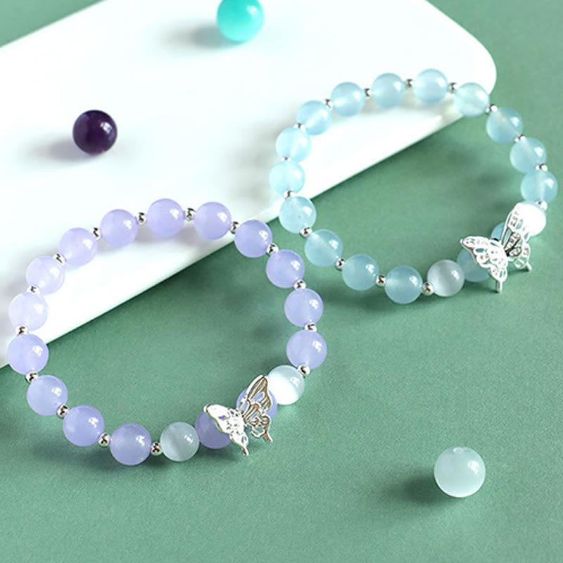 Bracelet spirituel énergétique en calcédoine bleue et papillon