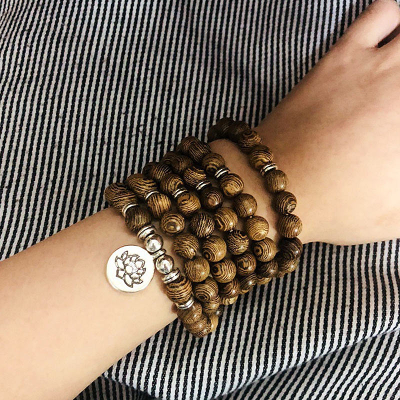 Bracelet Mala en bois fait main avec symbole de Bouddha Lotus
