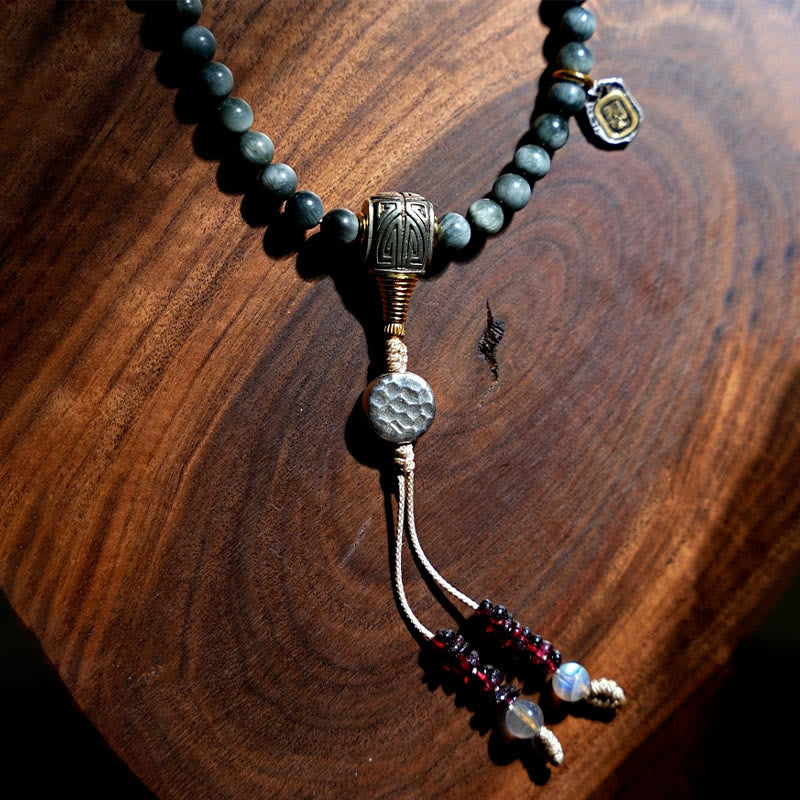 Bracelet Mala 108 perles en pierre œil d'aigle pour une énergie positive