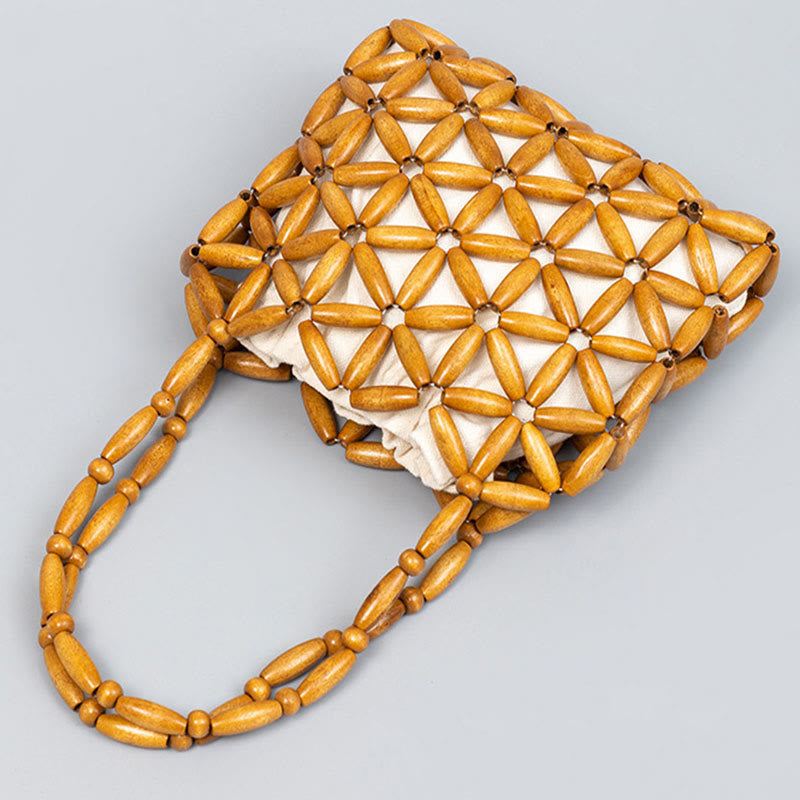 Sac à bijoux spirituel en mini perles de bois tissées à la main