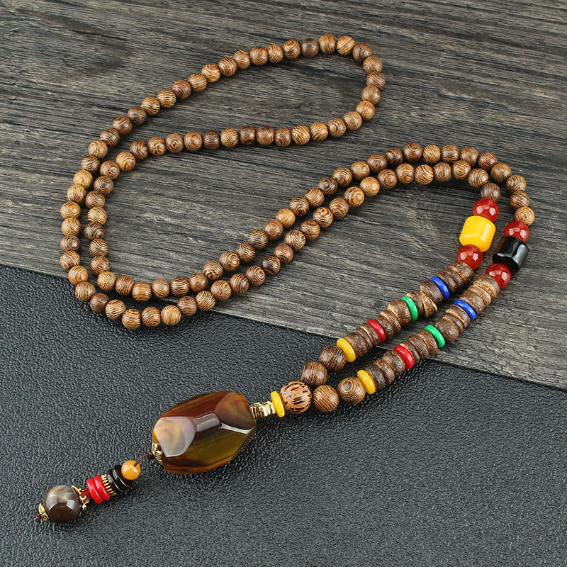 Collier d'équilibre en bois de wengé et agate pour la paix et la protection