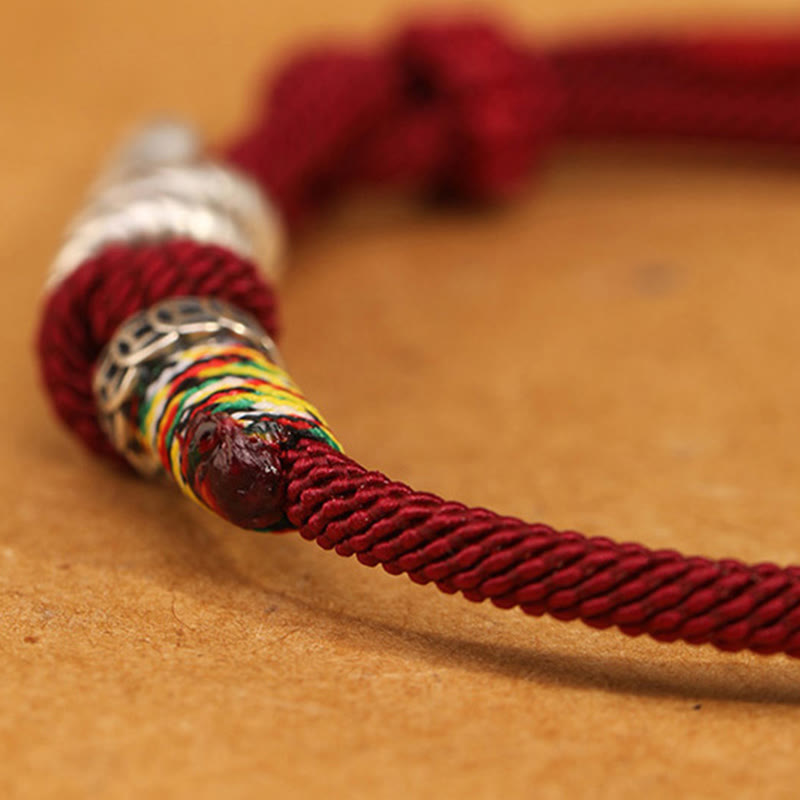Bracelet en argent sterling rouge foncé 14-17 cm avec pièce de monnaie serpent et cordon rouge