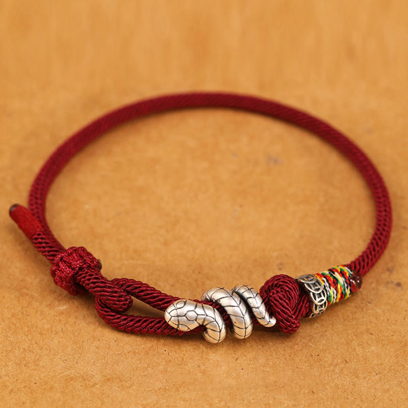 Bracelet en argent sterling rouge foncé 14-17 cm avec pièce de monnaie serpent et cordon rouge