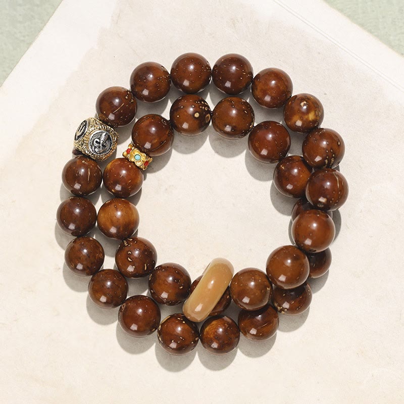 Bracelet spirituel double tour en or violet et graine de Bodhi