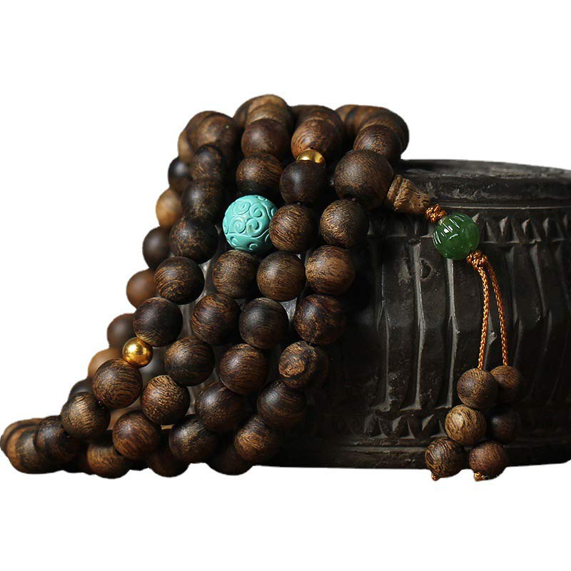 Bracelet Mala 108 perles en bois d'agar turquoise pour la méditation