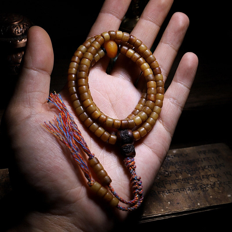 Bracelet Mala en os de yak et ambre à 108 perles pour l'équilibre
