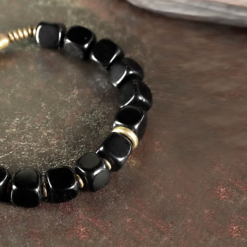 Bracelet unisexe en obsidienne noire et cuivre