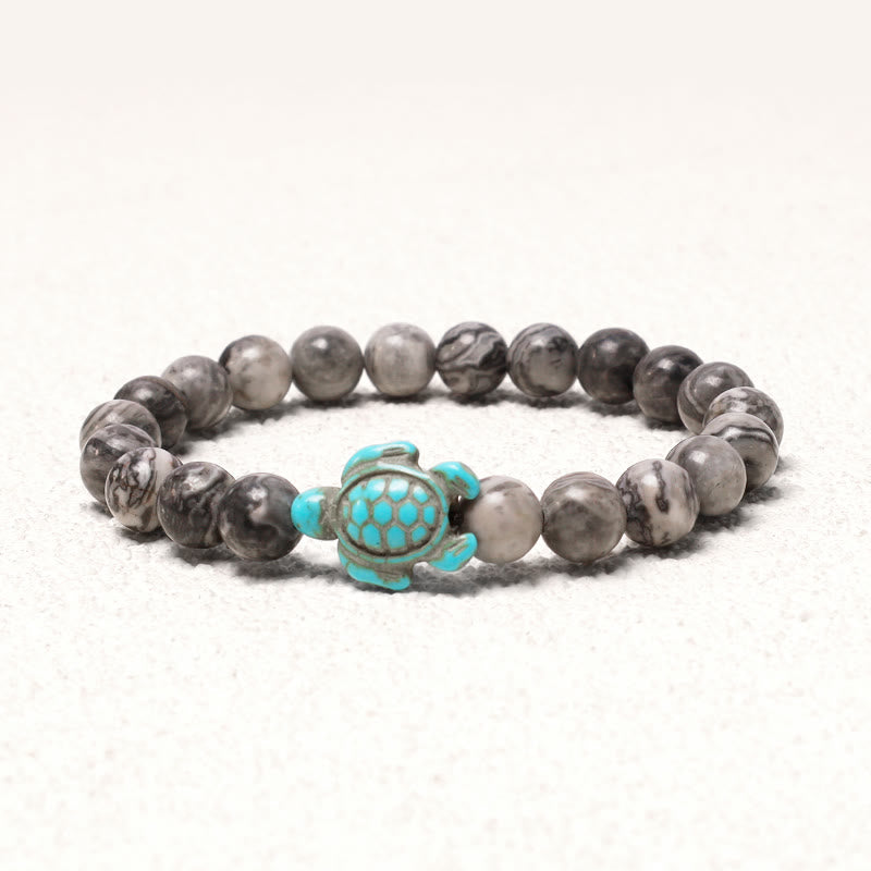 Bracelet turquoise de 8 mm avec breloque tortue de mer