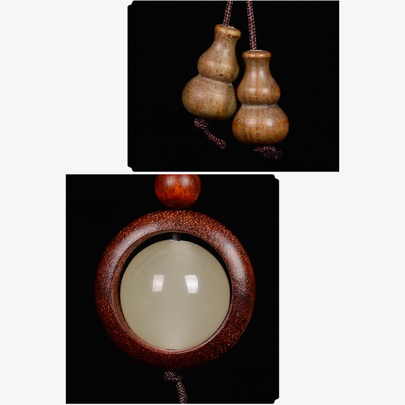 Porte-clés en bois d'ébène « Paix » | Perles lumineuses en bois de santal rouge et vert
