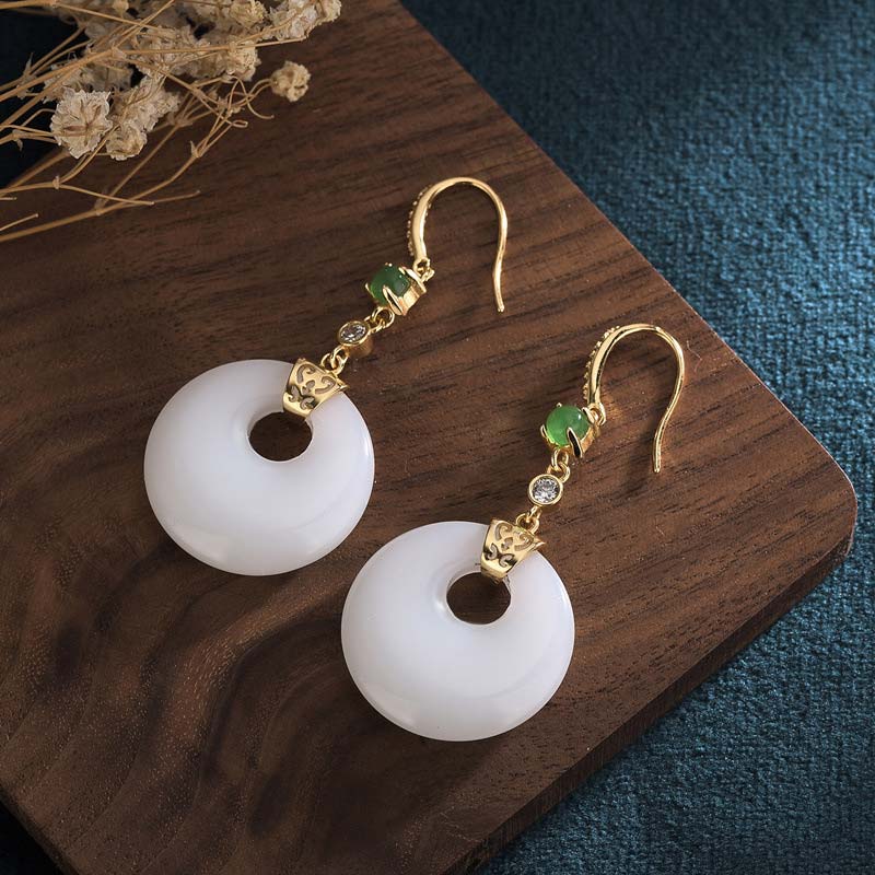 Boucles d'oreilles pendantes en jade blanc pour la protection et la chance
