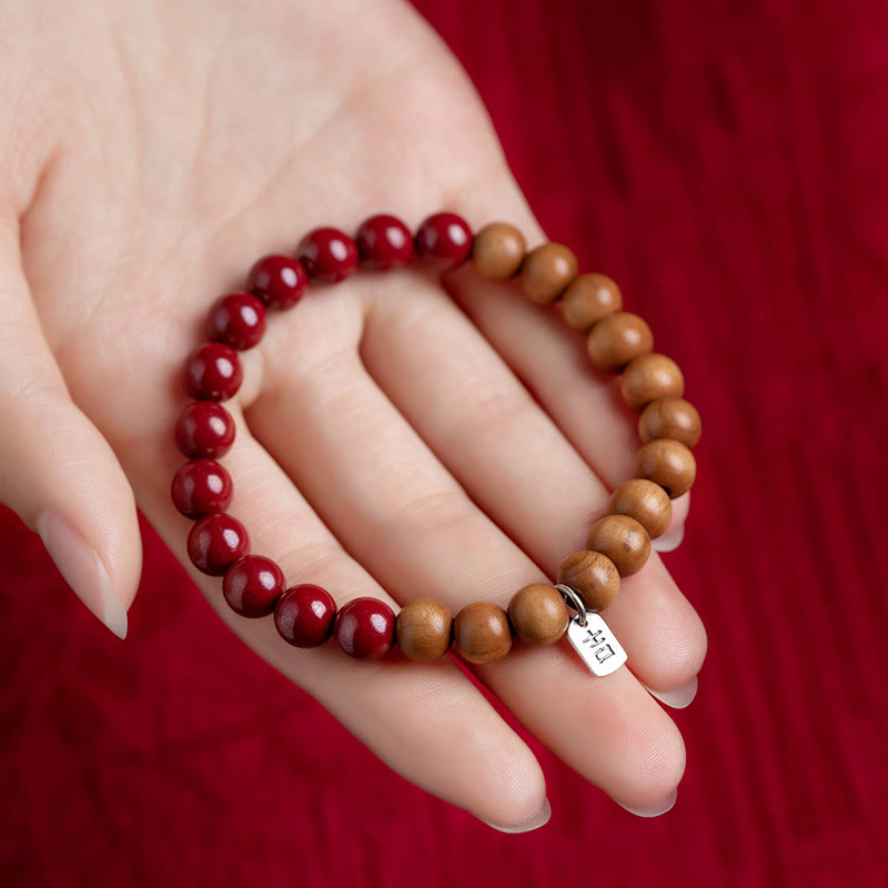 6mm Cinnabar Bracelet with Peach Wood & Sterling Silver Protection