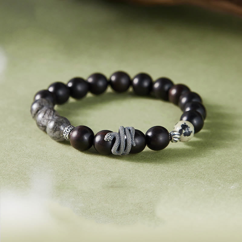 Bracelet d'équilibre en bois d'ébène et quartz rutile noir 10 mm