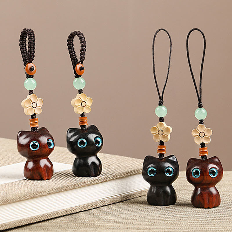 Porte-clés chat porte-bonheur en bois d'ébène pour la paix et l'équilibre spirituels