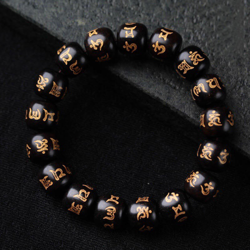 Bracelet de paix Om Mani Padme Hum en bois d'ébène pour l'équilibre