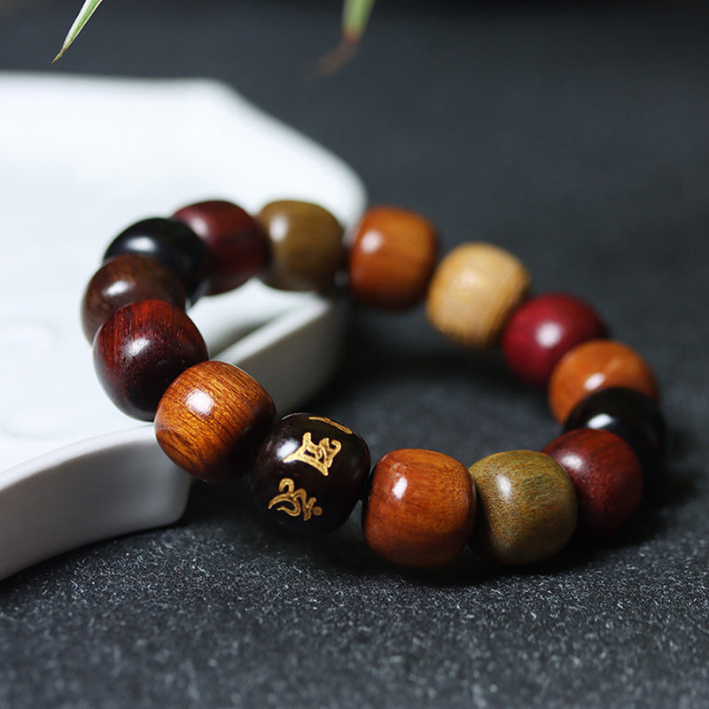 Bracelet Pureté Om Mani Padme Hum en bois d'ébène 14 mm