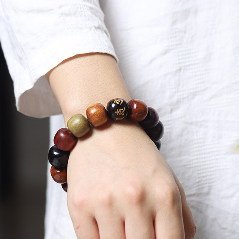 Bracelet Pureté Om Mani Padme Hum en bois d'ébène 14 mm