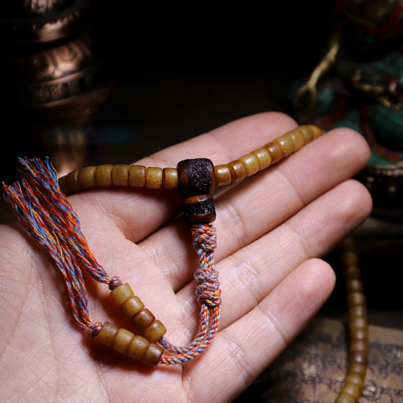 Bracelet Mala en os de yak et ambre à 108 perles pour l'équilibre