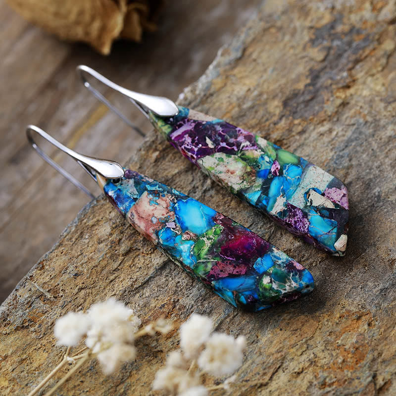 Boucles d'oreilles en pierre de l'empereur pour l'équilibre et la sérénité
