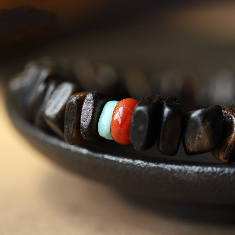 Bracelet d'équilibre en agate rouge et bois d'agar pour la méditation et la paix