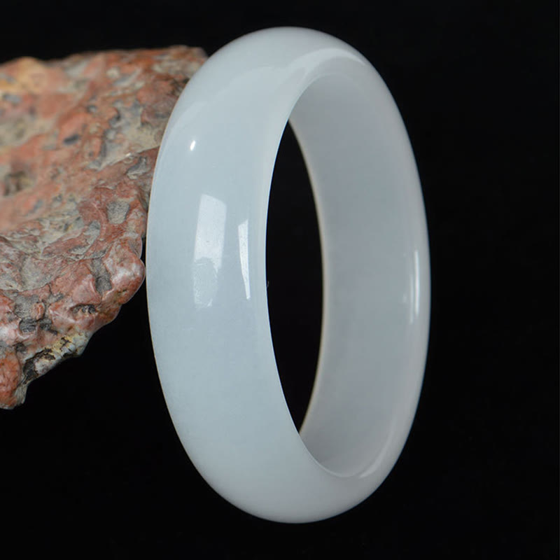 Bracelet jonc en jade et soie dorée 58 mm pour la richesse et la chance