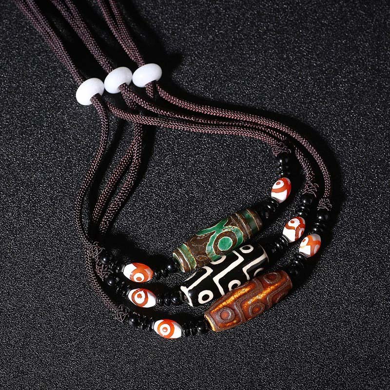 Collier unisexe en perles dzi à neuf yeux | Protection en agate