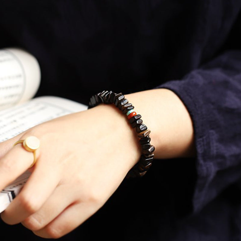 Bracelet d'équilibre en agate rouge et bois d'agar pour la méditation et la paix
