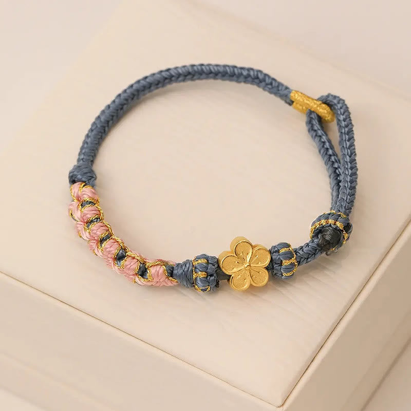 Bracelet de richesse en cuivre et fleur de pêcher pour l'équilibre