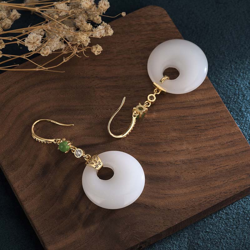 Boucles d'oreilles pendantes en jade blanc pour la protection et la chance