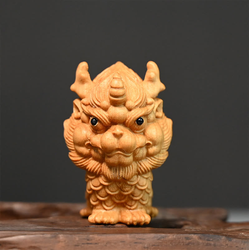 Statue spirituelle Feng Shui Kirin en buis gravé