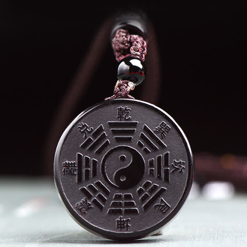 Collier pendentif force obsidienne noire Bagua Yin Yang