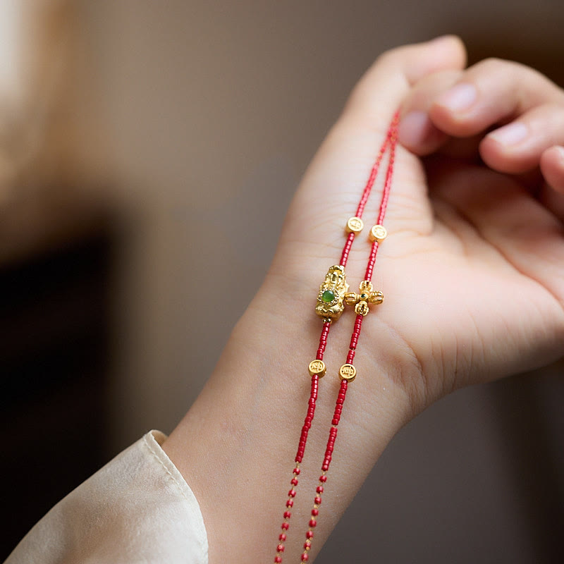 Bracelet PiXiu plaqué or avec trèfle à quatre feuilles