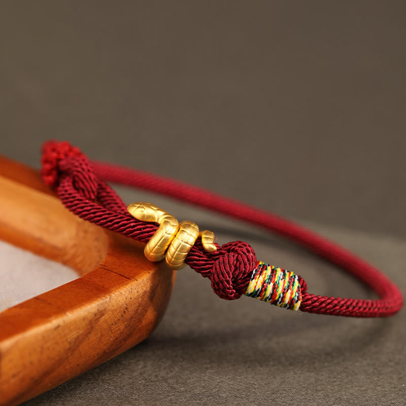 Bracelet de protection porte-bonheur en fil rouge serpent doré