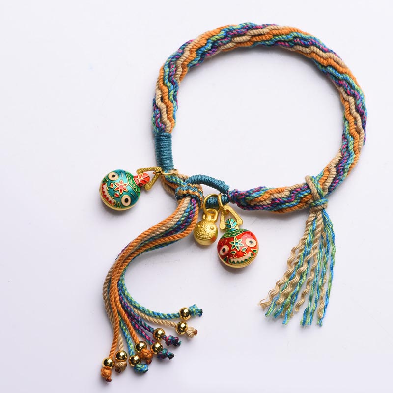 Bracelet porte-bonheur en or de la famille des Bêtes avaleuses | Cordon coloré