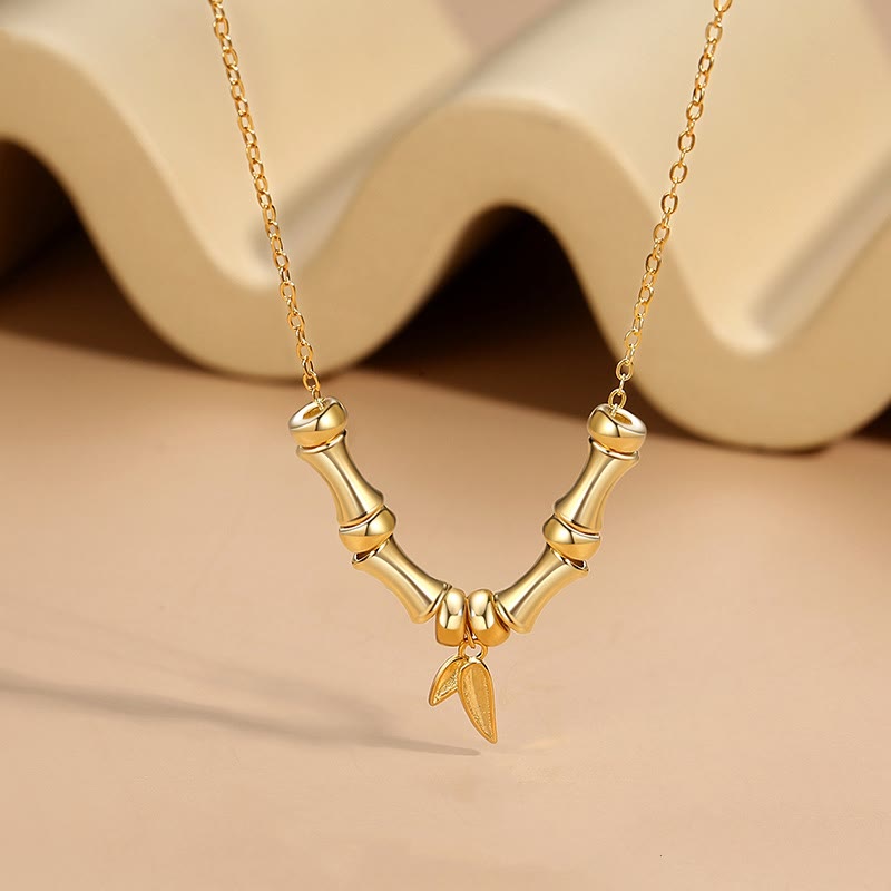 Collier spirituel en acier titane à motif bambou doré pour la richesse