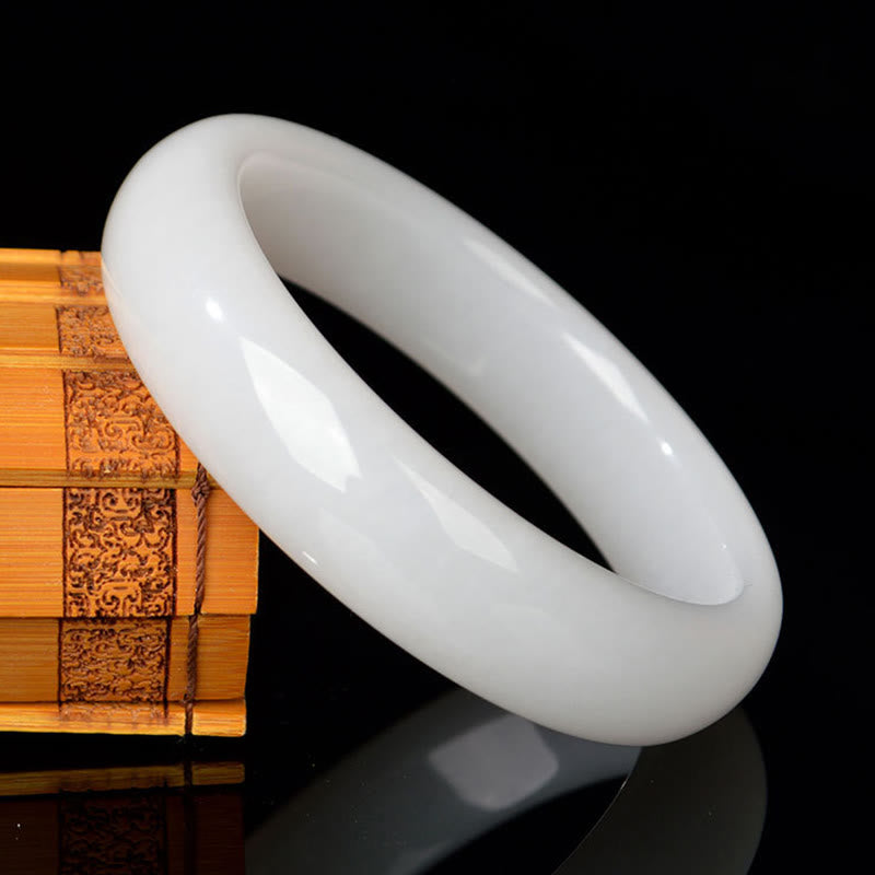 Bracelet jonc en jade et soie dorée 58 mm pour la richesse et la chance
