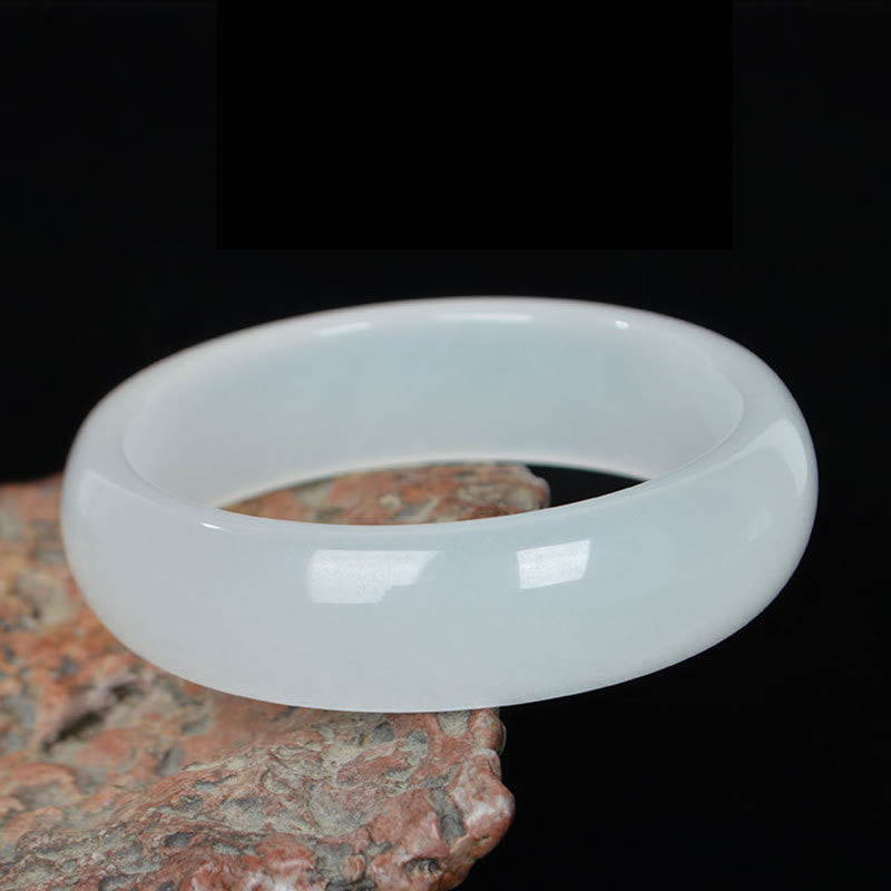 Bracelet jonc en jade et soie dorée 58 mm pour la richesse et la chance