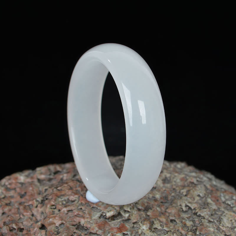 Bracelet jonc en jade et soie dorée 58 mm pour la richesse et la chance