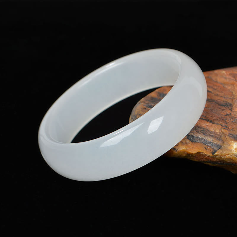 Bracelet jonc en jade et soie dorée 58 mm pour la richesse et la chance