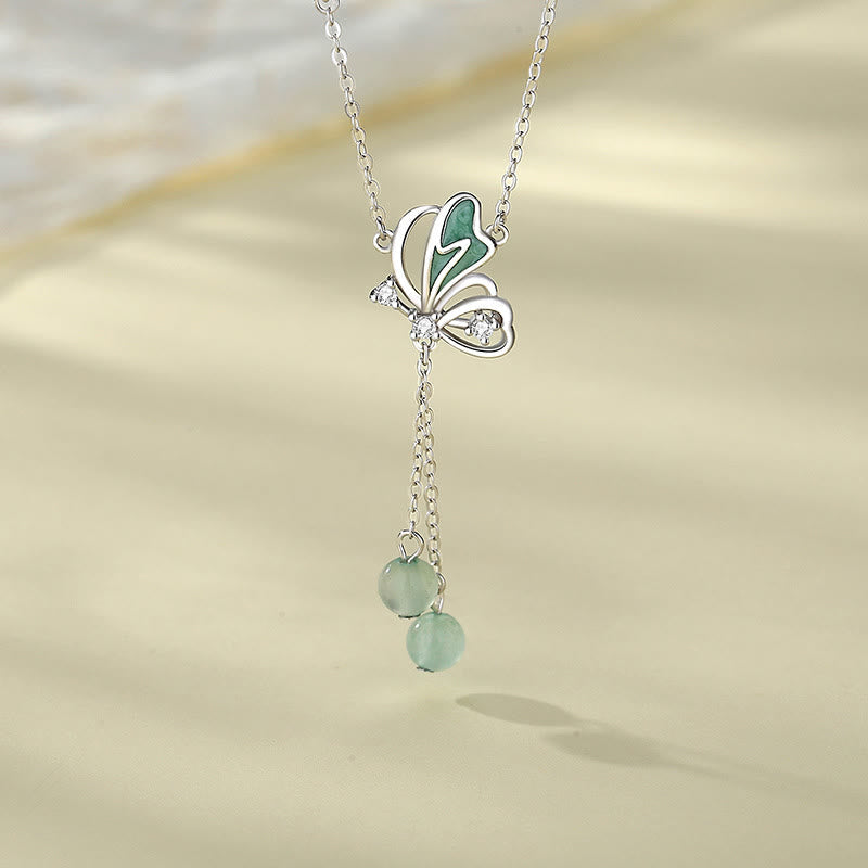 Ensemble collier et boucles d'oreilles papillon en aventurine verte