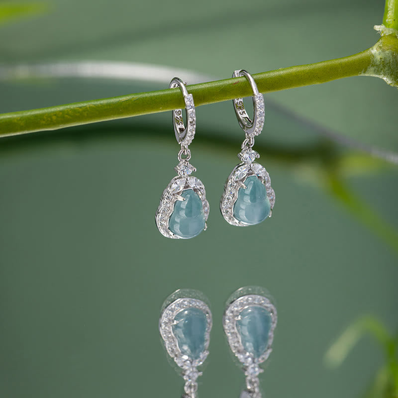 Boucles d'oreilles pendantes en jade vert pour l'abondance et la prospérité