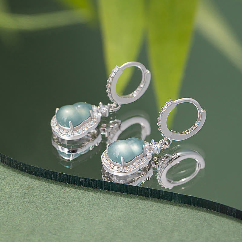 Boucles d'oreilles pendantes en jade vert pour l'abondance et la prospérité