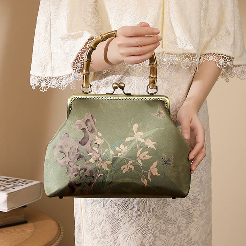 Sac à bandoulière avec poignée en bambou et plantes vertes