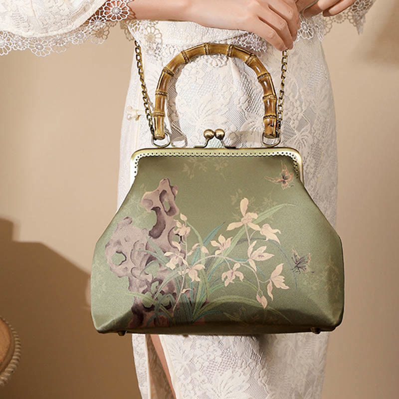 Sac à bandoulière avec poignée en bambou et plantes vertes