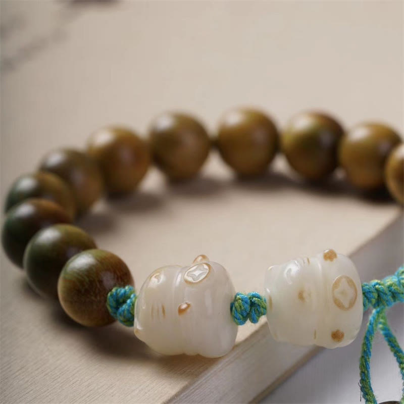 Bracelet spirituel en bois de santal vert et graines de Bodhi pour la positivité