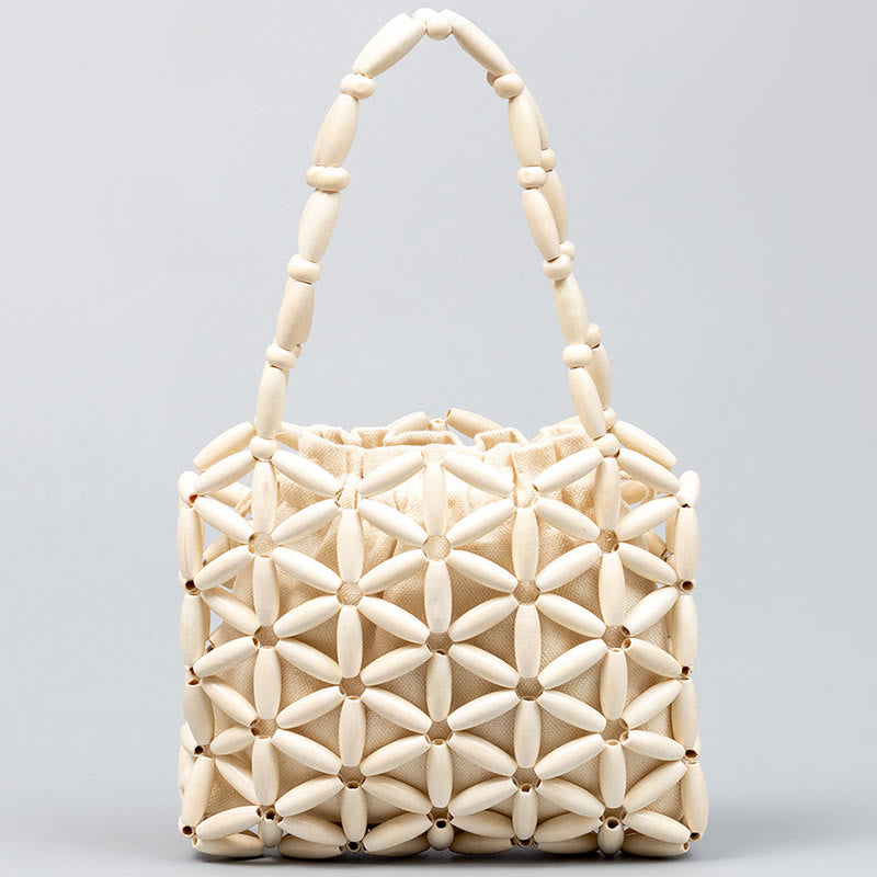 Sac à bijoux spirituel en mini perles de bois tissées à la main