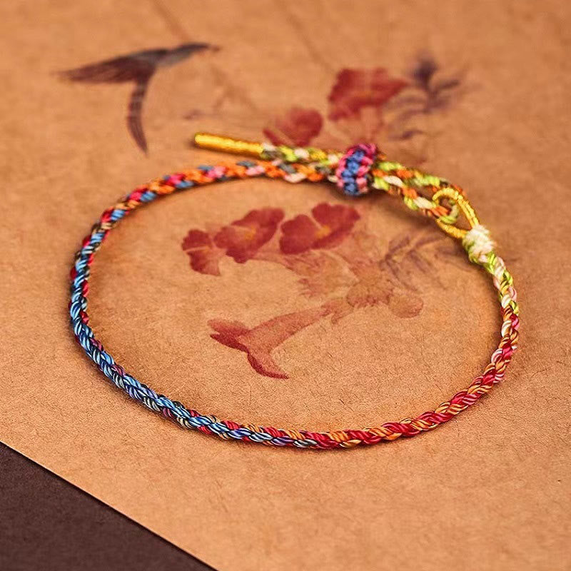 Bracelet en corde rouge coloré fabriqué à la main pour la chance et la protection